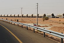 A Phosphate train passing near the Desert Highway 20100927 aqaba002.JPG