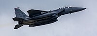 An F-15E Strike Eagle, tail number 01-2003, taking off from RAF Lakenheath in England. The aircraft is assigned to the 494th Fighter Squadron.