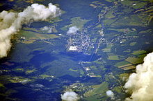 Aerial view of Greene from the south, 2013. The Chenango River can be seen running roughly north-south in the eastern part of town. Aerial - Greene, NY from SW 01 - white balanced (9641627522).jpg