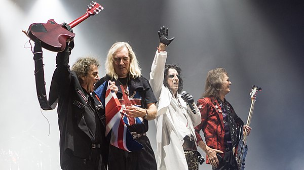 Bruce (far left) on stage with his ex-Alice Cooper bandmates in 2017