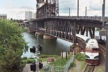 An Amtrak Cascades train crossing the bridge Amtrak talgo train crossing steel bridge.jpg