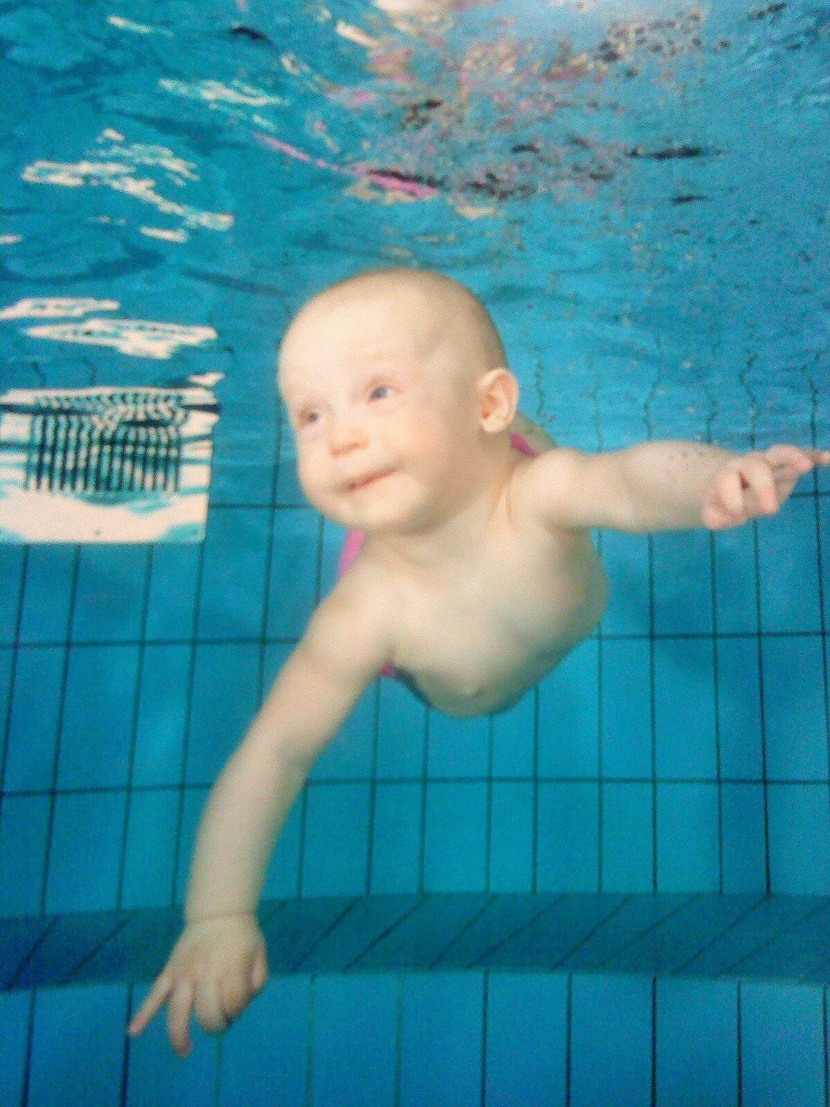 baby floating in water