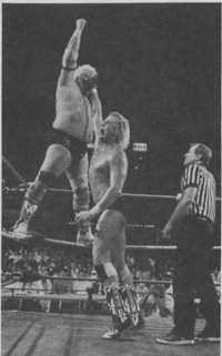 Windham clawing the face of Dusty Rhodes during their match at the 1988 Great American Bash Barry Windham claws Dusty Rhodes during their match at The Great American Bash, 1988.png