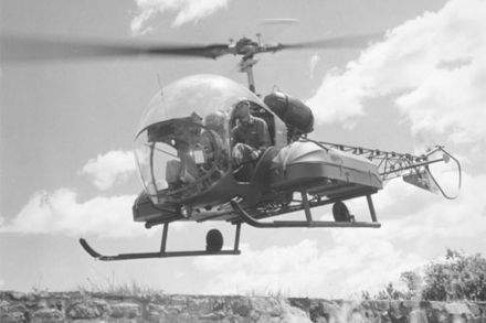 Bell 47 with patient transfer panniers.