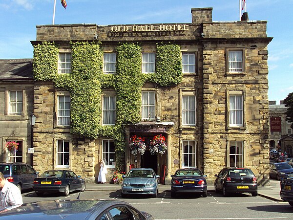 The Old Hall Hotel at the south-west end of the attached range of listed buildings