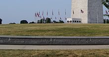 A low-profile ha-ha wall surrounds the monument. Buildings in Washington, D.C. 01907 (cropped) ha-ha wall 2.JPG