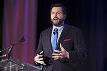 Duhigg speaking at The Ohio State University Center for Operational Excellence Charles Duhigg at the Leading Through Excellence summit in 2013.jpg