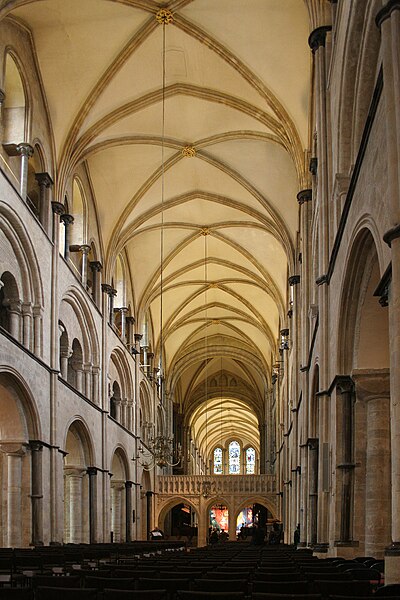 The interior of Chichester Cathedral, showing the Romanesque stonework. The interior was reworked after a fire in 1187, but the basic structure dates 