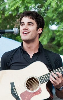 Darren Criss (pictured) auditioned for Glee, set on getting the role of Finn before being cast as Blaine a year later. Darren Criss Chicago concert.jpg