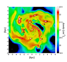 Violent gravitational Instability in a disk galaxy in the early universe, based on a hydro-cosmological computer simulation (Dekel et al., 2011) The picture of gas density shows that the disk is fragmented to giant clumps where stars form. The disk radius is 30,000 light years. Dekel photograph.png