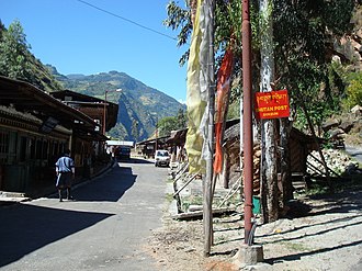 Main street of Duksum Trashiyangtse district, Bhutan Duksum main street Oct 2008 059 461 kb.jpg