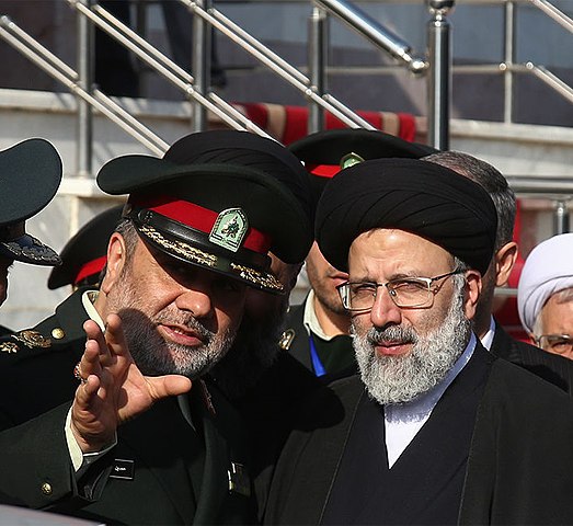 https://upload.wikimedia.org/wikipedia/commons/thumb/5/51/Ebrahim_Raisi_at_Naja_headquarter_2.jpg/523px-Ebrahim_Raisi_at_Naja_headquarter_2.jpg