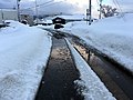 融雪装置で冠水した道路