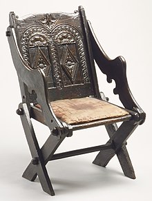 A similar British chair, oak, circa 1600, now in the Metropolitan Museum of Art Folding chair MET ES4958.jpg