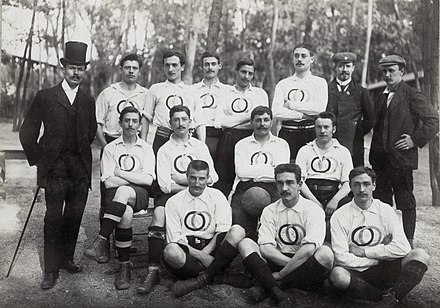 USFSA team that represented France at the 1900 Summer Olympics, wearing a white shirt with the rings emblem. That shirt was also worn in the first international v Belgium in 1904