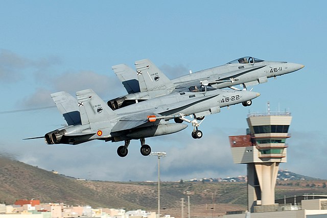 Two F-18s of the Spanish Air Force taking off from Gando Air Base, which shares space with the airport
