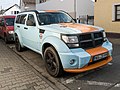 * Nomination: Gulf colored Dodge Nitro, Bischofsheim --MB-one 08:00, 30 March 2023 (UTC) * Review It looks pretty distorted to me due to the wide angle and short distance to the motif --Poco a poco 17:41, 30 March 2023 (UTC)