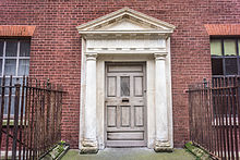 A Georgian door on Henrietta Street, which contains some of the oldest and largest Georgian houses in Dublin. These became tenements in the 19th century. Henrietta Street 7680190900.jpg
