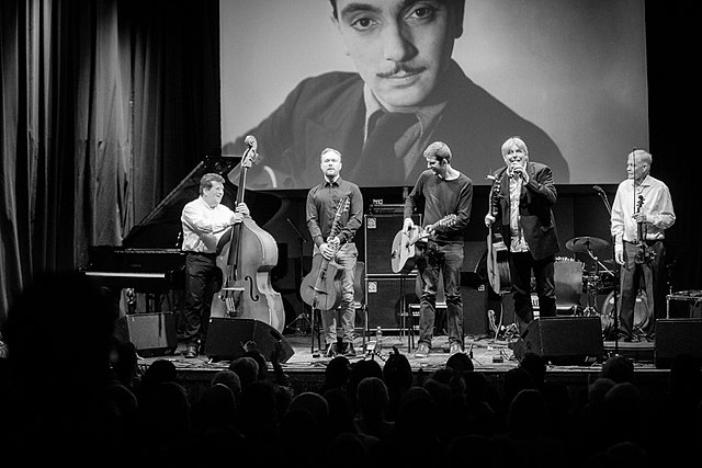 An image of Django Reinhardt, "originator" of gypsy jazz, presides over the Hot Club de Norvège at Djangofestivalen 2018