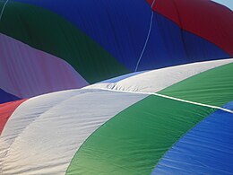 Color constancy: The colors of a hot air balloon are recognized as being the same in sun and shade. Hot air balloon - color constancy.jpg