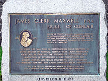 This memorial stone to James Clerk Maxwell stands on a green in front of the church, beside the war memorial at Parton (Galloway). JCM Memorial Stone-1.jpg