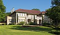 ロイド・ギデオン・ジョンソン邸、1919年に地元銀行家が建設し、1937年から1990年までサンマルコス・フリーメイソン支部、現在は修復されて個人の家になっている[51]