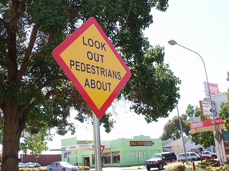 File:Look Out Pedestrians About sign in Parkes NSW.jpg