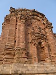 Trefoil arches crowning blind niches on Malot Temple, Pakistan, built around 980 AD.