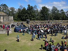 A large crowd of indigenous Mayan people and tourists gathered around an outdoor stage erected in the middle of the Iximche ruins on 21 December 2012.