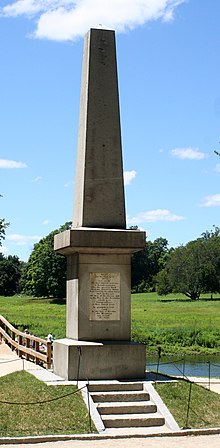 Emerson's "Concord Hymn" was written for the dedication of the memorial of the Battle of Concord. Memorial obelisk - Old North Bridge.jpg