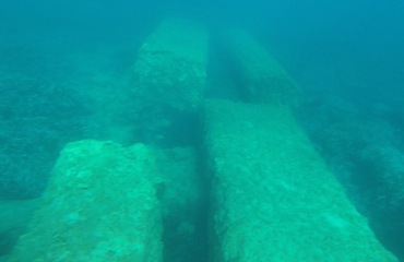 Over 150 tonnes (330,000 lb) of marble blocks lying on the sea floor, from a shipwreck near Methoni, Greece
