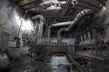 Pump room of an abandoned mine Mine bottom - Flickr - olavXO.jpg