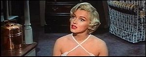 Immagine Monroe listening in The Seven Year Itch trailer 1.jpg.