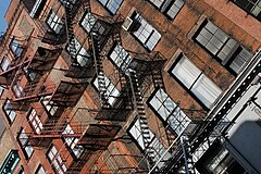 Buildings with fire exit ladders in Soho. New York City 2005