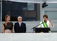 President Dilma Rousseff delivers her inaugural address as Vice President Temer and wife Marcela look on,1 January 2011. Posse Dilma 2010 9.jpg