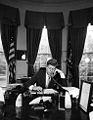 1962 - President Kennedy addresses the AMVETS convention in New York City by telephone