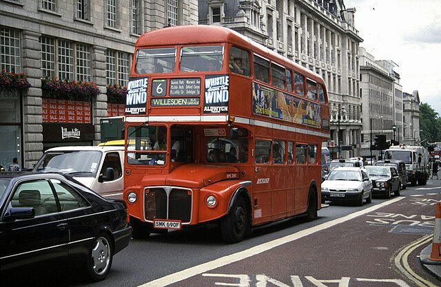 An AEC Routemaster double-decker operated by Metroline approaching Piccadilly Circus, 1998
