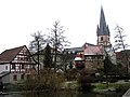 Schrepfersmühle (Tremelsmühle) und Pfarrkirche mit Beinhaus von der Baunach aus