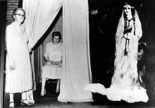 The spirit guide Silver Belle was made from cardboard. Both Parrish and the lady standing outside the curtain were in on the hoax. Silver Belle Fraud.jpg