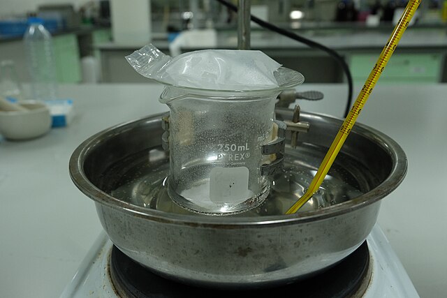 Experimental set up for the sublimation reaction of naphthalene Solid naphthalene sublimes and form the crystal-like structure at the bottom of the wa