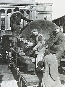 Workers removing the Sunball, 1946 Sunballremoval.jpg