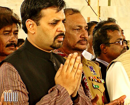 Syed Mustafa Kamal at the tomb of Quaid-e-Azam.jpg