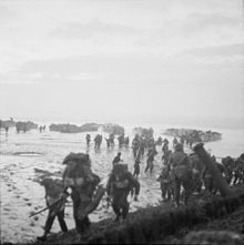 Men of the 4th Special Service Brigade wade ashore from landing craft near Flushing to complete the occupation of Walcheren The Allied Campaign in North-west Europe, 6 June 1944 - 7 May 1945 BU1244.jpg