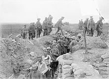 Escort of the 10th (Service) Battalion, Worcestershire Regiment bringing in German prisoners captured during the attack on La Boisselle, France, 3 July 1916. The Battle of the Somme, July-november 1916 Q763.jpg