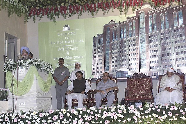 Manmohan Singh, then Prime Minister of India, speaks at the inauguration of Saifee Hospital on June 4, 2005. Seated on the podium are Vilasrao Deshmuk