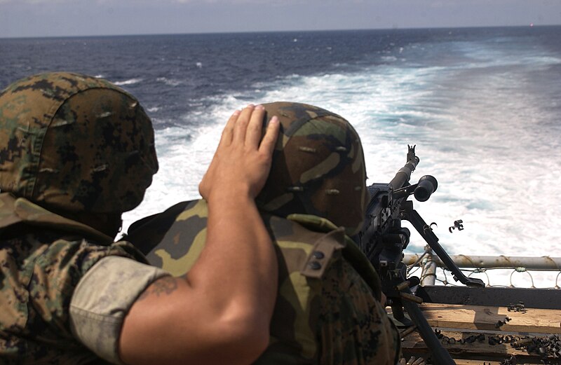 File:US Navy 040701-M-0374B-008 Pfc. Daniel Schluttenhofer, assigned to 3rd Medical Battalion, 3rd Force Service Support Group, fires a M-240G medium machine gun.jpg