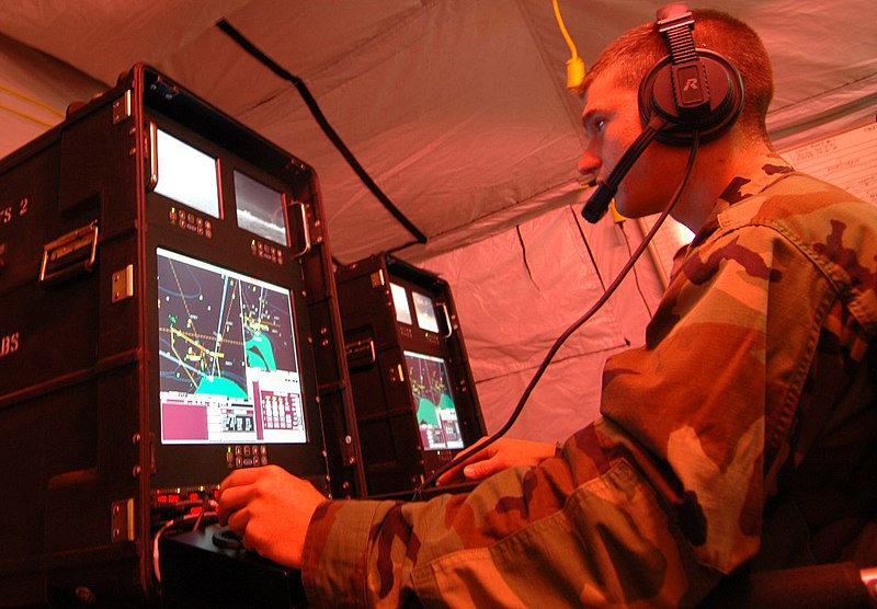 File:US Navy 060606-N-7987M-028 Operations Specialist 3rd Class David Bently operates a graphical data fusion system (GDFS) for the tactical operations center during exercise DELMAR at Fort Story.jpg