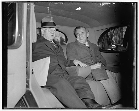 WPA Administrator and ace 'brain truster.' Washington, D.C., Dec. 6. Secretary of Interior Harold Ickes and 'Tommy' Corcoran, the administration's ace - brain truster, pictured leaving the LCCN2016874505.jpg