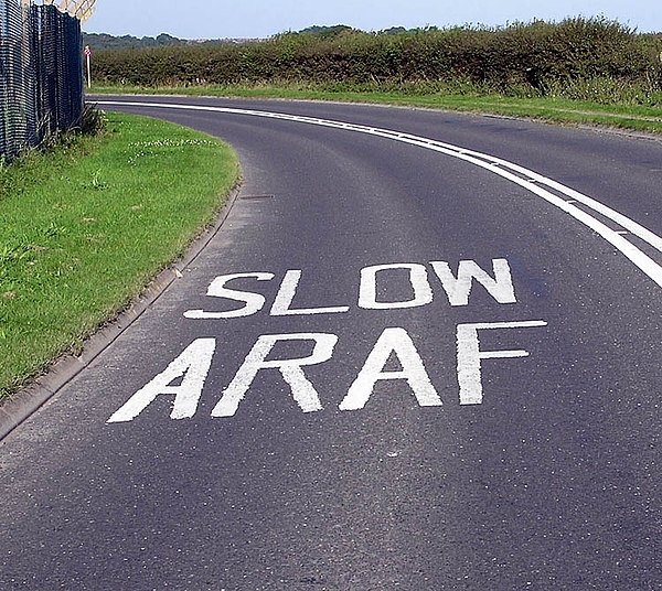 Bilingual road markings near Cardiff Airport.