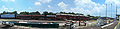 Panorama view of tracks and railcars behind the former Amtrak station. Now a CSX station and maintenance area.